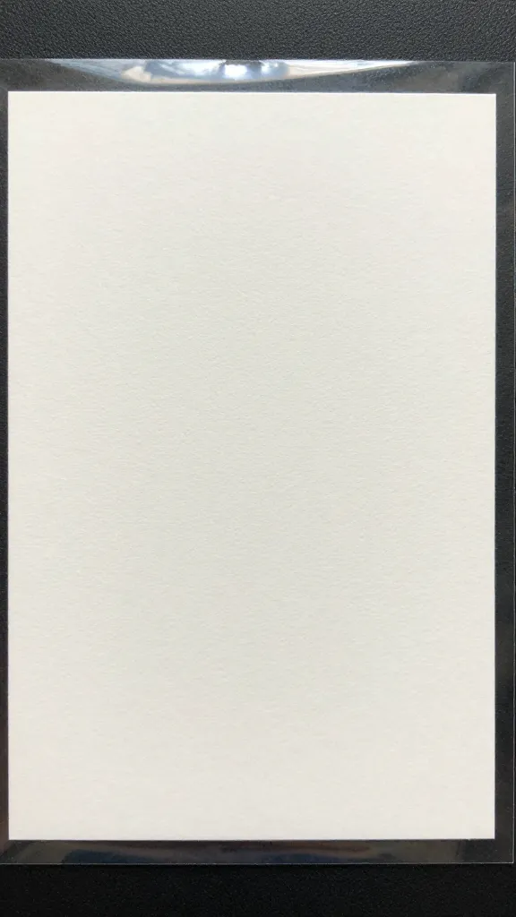 Closeup of watercolor-painted card protected by transparent sealant